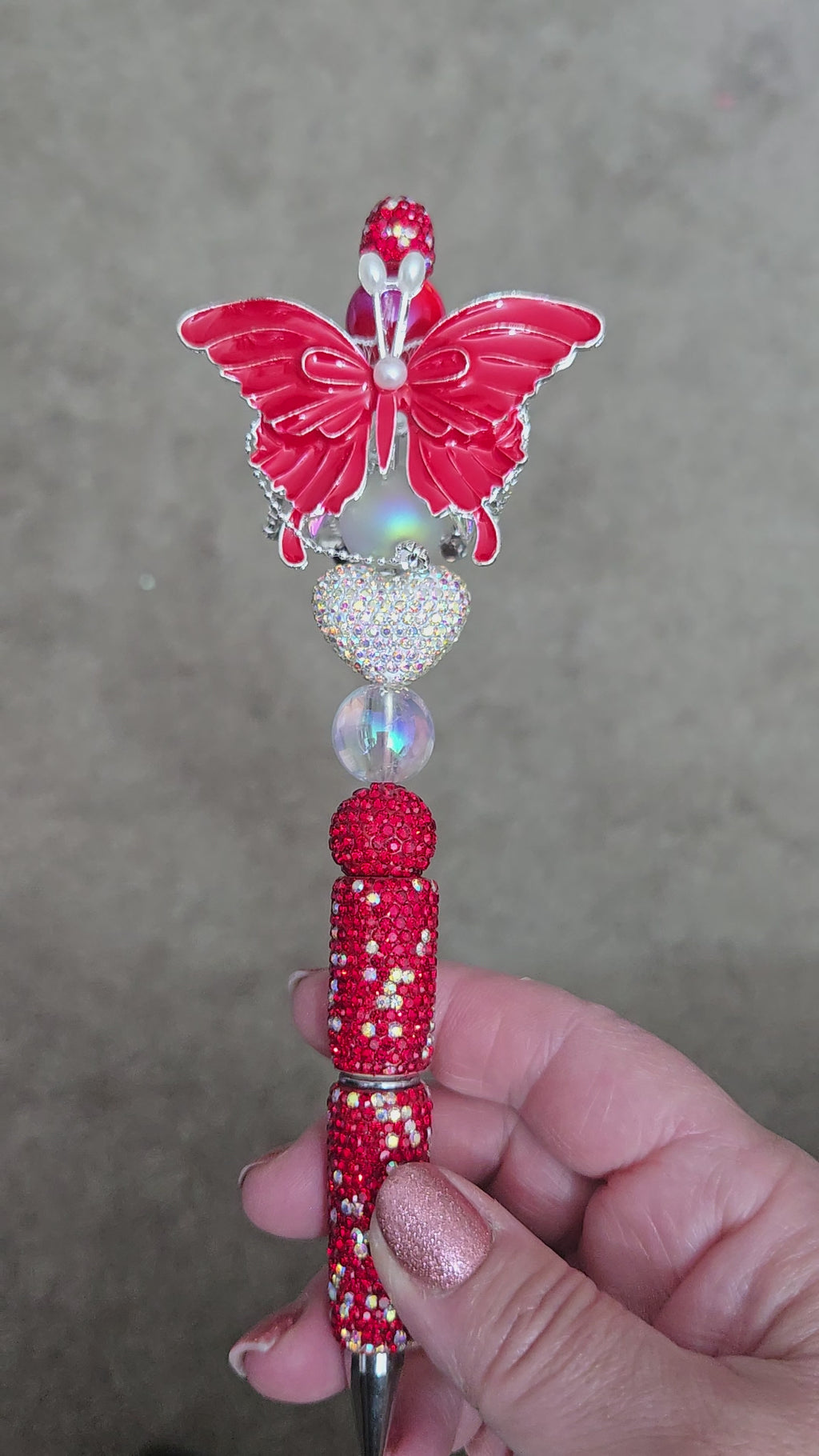 Red butterfly pen
