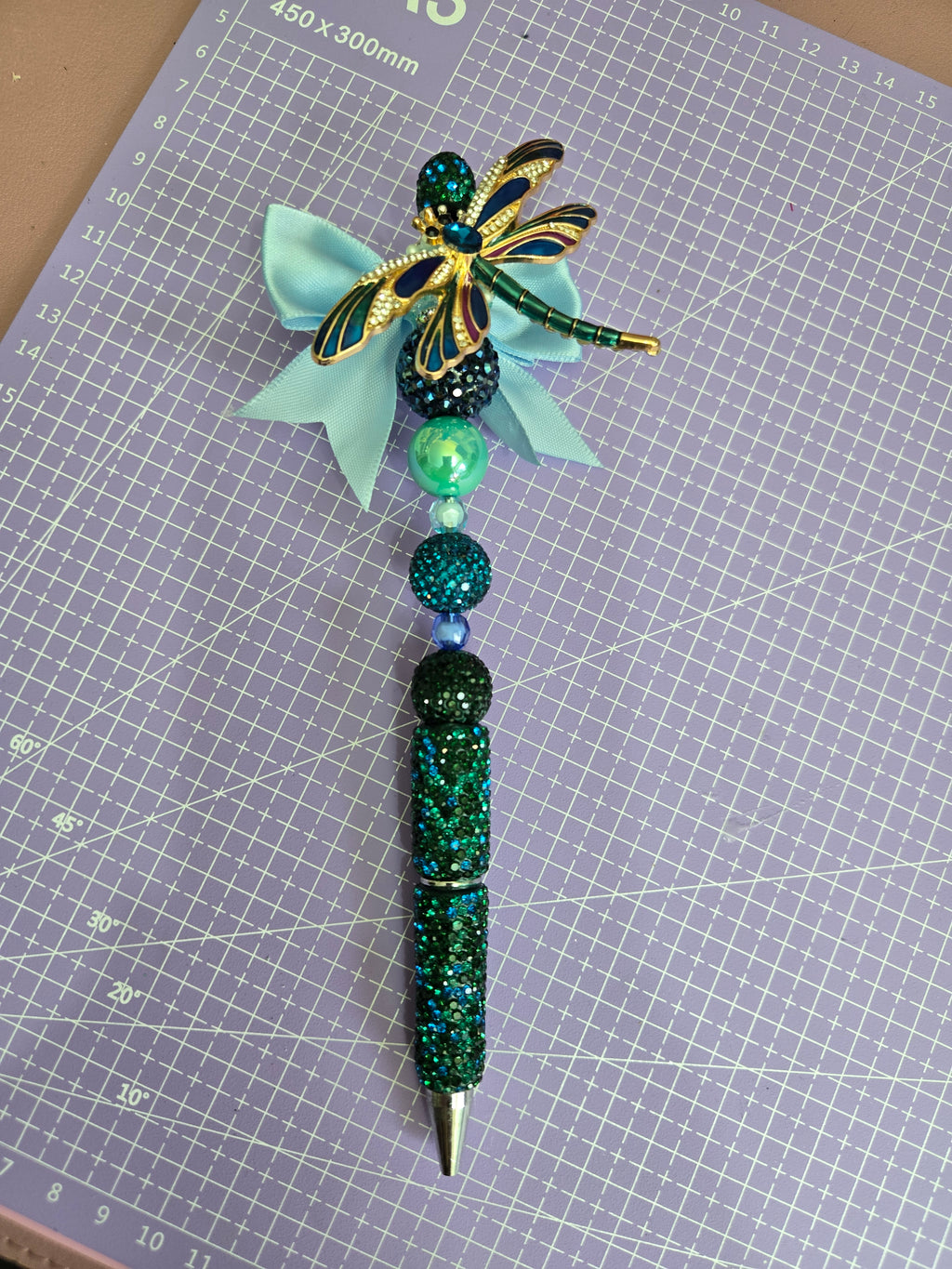 Green dragonfly pen