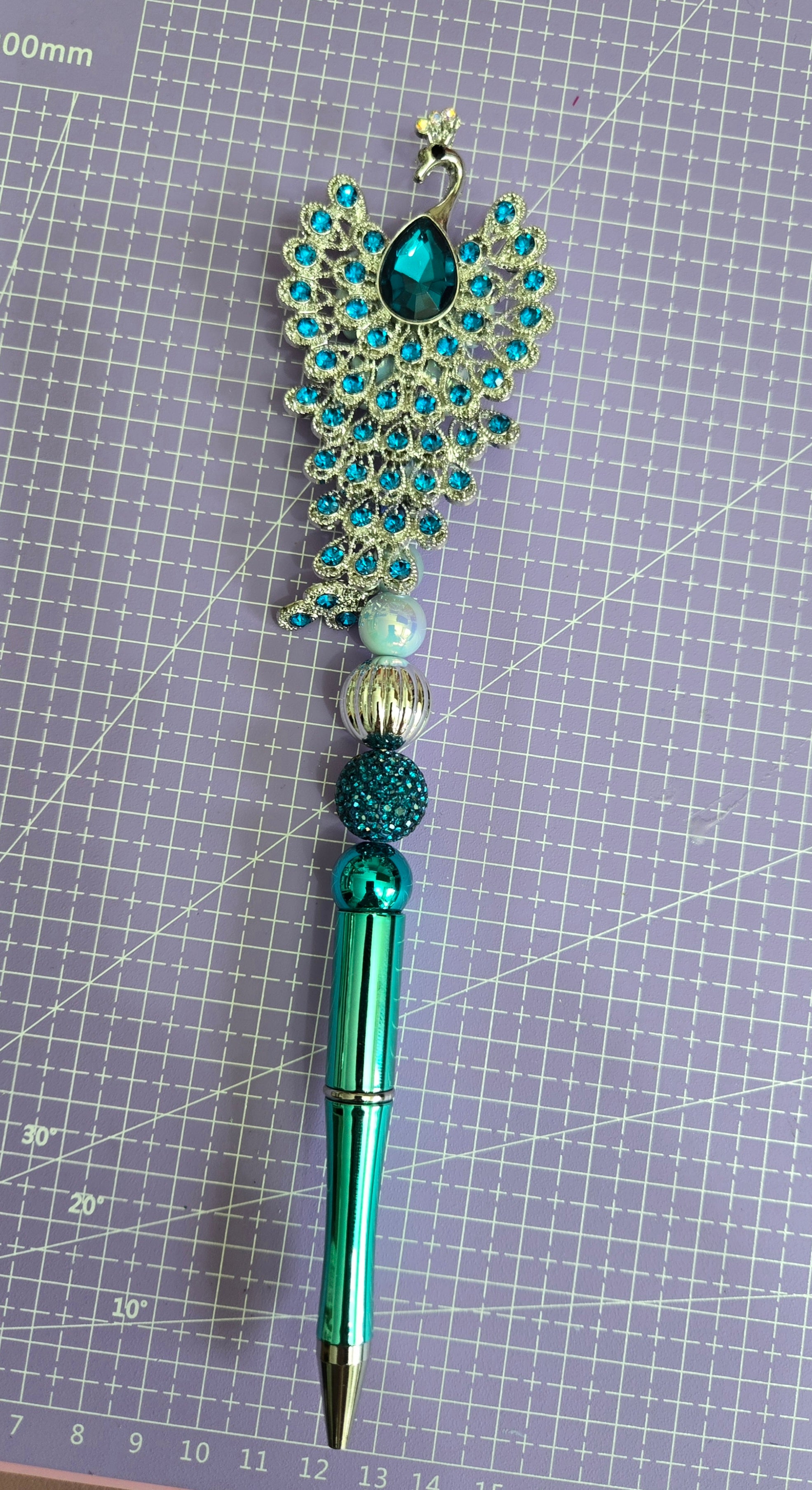 Peacock pen
