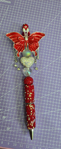 Red butterfly pen