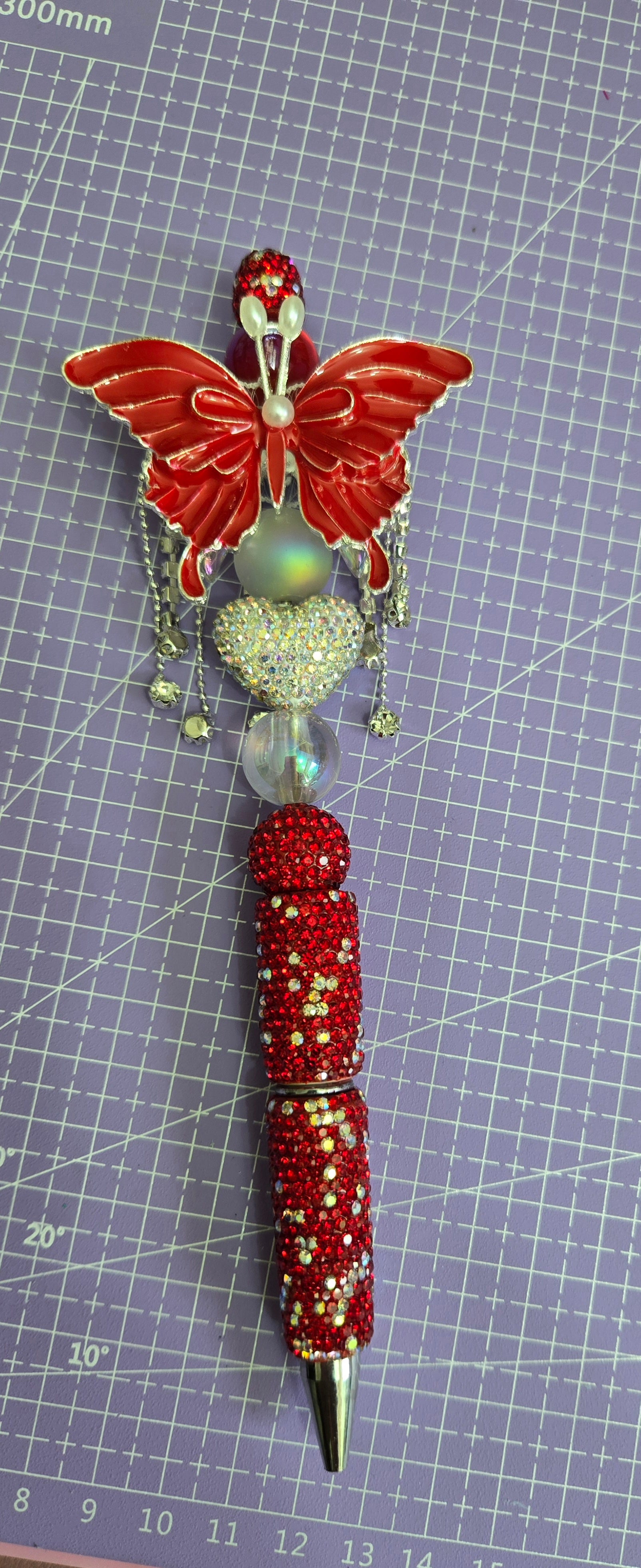 Red butterfly pen